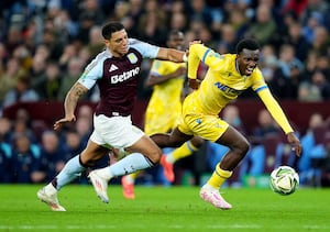 Aston Villa's Diego Carlos battles for the ball with Crystal Palace's Eddie Nketiah 