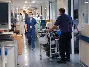 A general view of staff on a NHS hospital ward at Ealing Hospital in London.