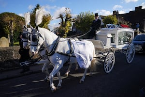 A horse-drawn carriage carrying the coffin of Liam Payne arrives for the funeral service of the One Direction singer at St Mary's Church in Amersham, Buckinghamshire. Picture date: Wednesday November 20, 2024. 