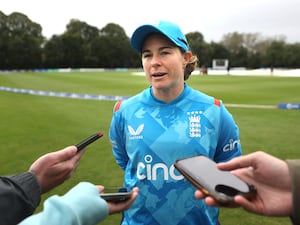 Tammy Beaumont talking to journalists