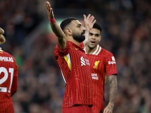 Mohamed Salah celebrates his match-winner against Brighton