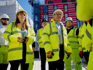 Angela Rayner and Sir Keir Starmer in safety gear on a building site