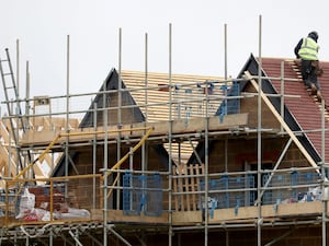 Roofers at work on newbuild houses