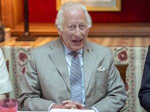 The King smiles as he joins a discussion with the Scottish Violence Reduction Unit on youth opportunities in 2024