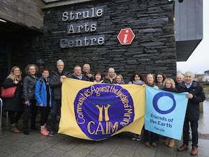 Protesters outside the Strule Arts Centre ahead of the public inquiry into the planning application for the Dalradian Gold Mine project in Greencastle