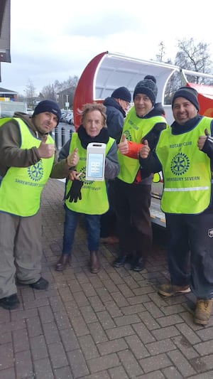 David, second left, with helpers.