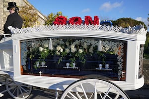 A horse-drawn carriage carrying the coffin of Liam Payne arrives for the funeral service of the One Direction singer at St Mary's Church in Amersham, Buckinghamshire. Picture date: Wednesday November 20, 2024. 