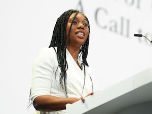 Kemi Badenoch on stage