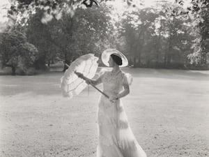 The then Princess Elizabeth in 1939, wearing a white dress with matching