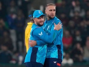 Liam Livingstone, right, celebrates a wicket