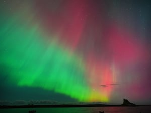 Northern Lights over Lindisfarne Castle in Northumberland