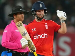 Ben Duckett puts his left thumb up to celebrate his half-century