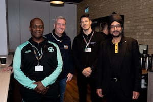 Garry Leslie pictured with a couple of representatives from LEAP, the energy advice and money saving service, and Wolverhampton West MP Warinder Juss. 