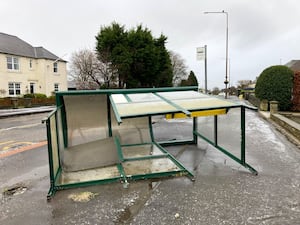 A bus shelter on its side in Dechmont in West Lothian