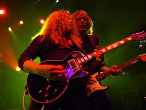 John Sykes on stage with Scott Gorham