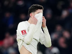 Kai Havertz covers his face with his shirt