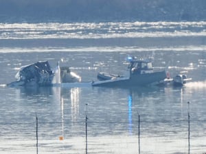 Search vessel next to wreckage in the Potomac river