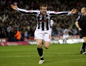 Chris Brunt celebrates his winner. He took interim charge of Albion before Mowbray's appointment.