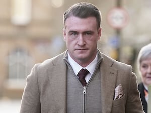 A close-up of Stuart Hogg in a jacket and tie