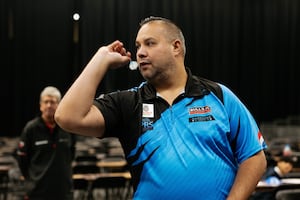 Jermaine Wattimena practiced throwing at the bullseye during the session