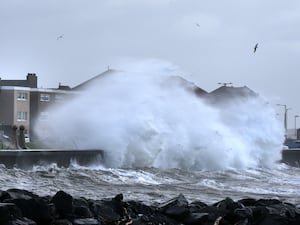 Large waves breaking on a sea wall