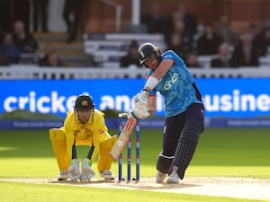 Jamie Smith drives through the covers