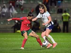 England and Portugal players contesting for the ball