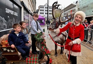 Youngsters meeting the reindeer at last year's switch on event