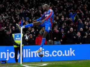 Crystal Palace’s Jean-Philippe Mateta celebrates by kicking the corner flag