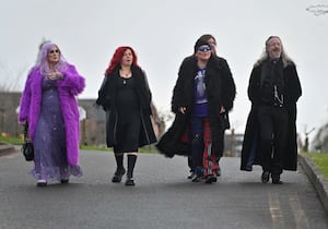 Landlady from the Giffard Arms Wendy Shone (L) wore purple in tribute to the Divine Miss M who was a popular entertainer at the rock pub.