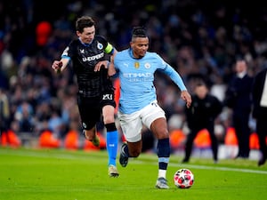 Manuel Akanji battles for the ball during Manchester City's Champions League clash with Club Brugge