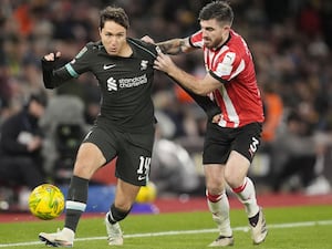 Liverpool forward Federico Chiesa is challenged by Southampton defender Ryan Manning