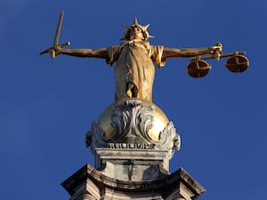 The statue of justice above the Old Bailey in London