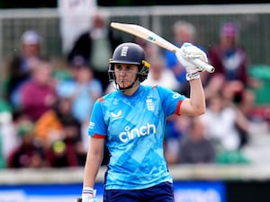 Nat Sciver-Brunt raises her bat