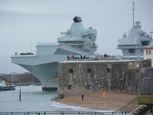 HMS Prince of Wales sailing from Portsmouth