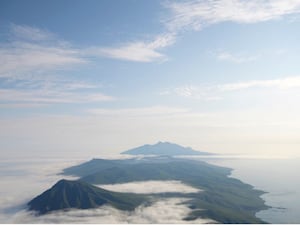 An island partly shrouded in mist