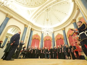 Charles and Camilla listening to the Military Wives Choir