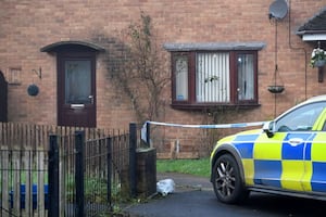 Police tape outside the house in Norton Canes