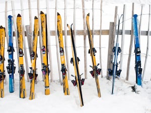 A row of skis at a ski centre