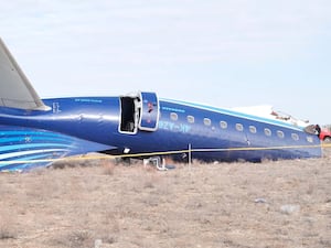 The wreckage of Azerbaijan Airlines Embraer 190 lies on the ground near the airport of Aktau, Kazakhstan