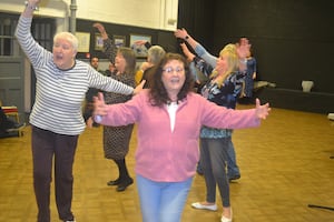 The ladies of the ensemble in rehearsal. 