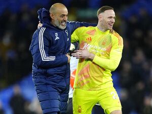 Nuno Espirito Santo celebrates with goalkeeper Matz Sels