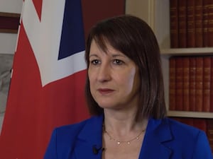 Chancellor Rachel Reeves in front of a Union flag