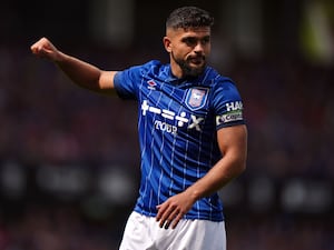 Ipswich captain Sam Morsy in a standard white armband with the Premier League logo