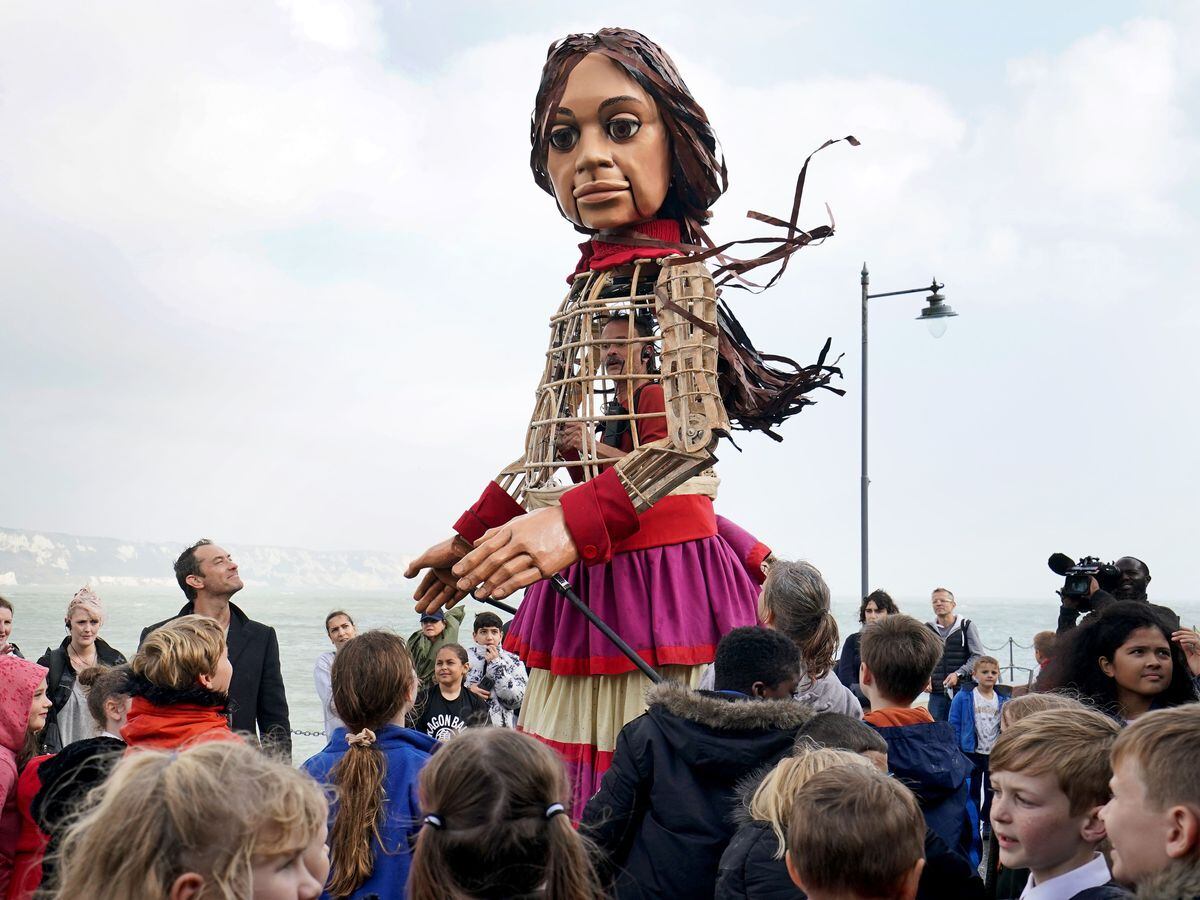 Giant puppet of Syrian child on 5,000-mile journey arrives on Kent ...