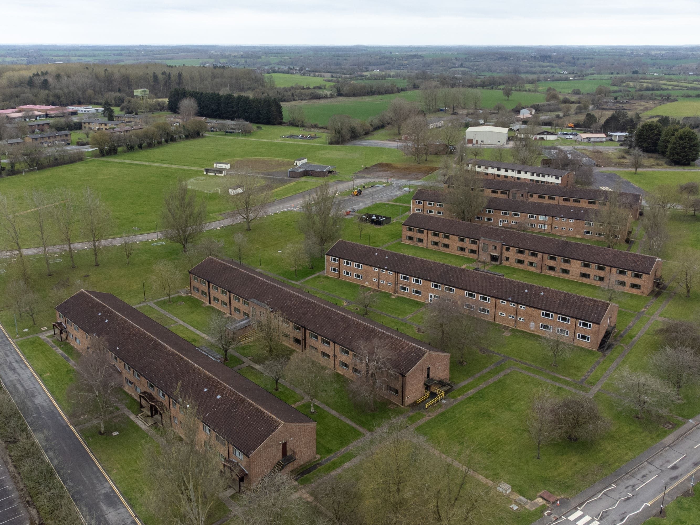 Asylum seekers wrongly housed at ‘prison-like’ former RAF base, High Court told