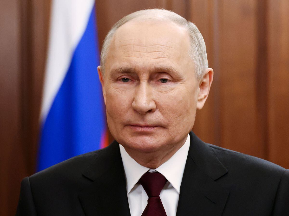 Putin officially registers as candidate for Russian presidential ...