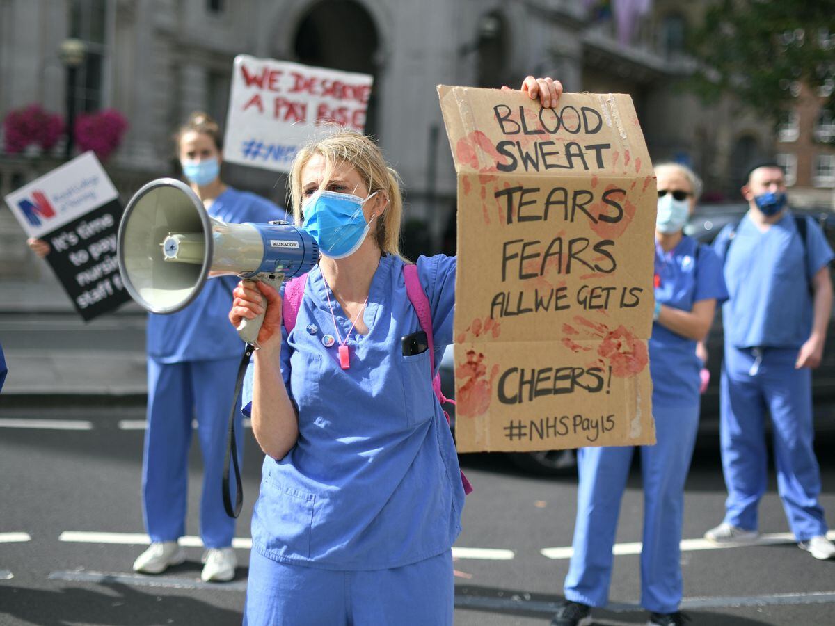 ‘Stop clapping, start paying’: NHS workers demand better wages ...