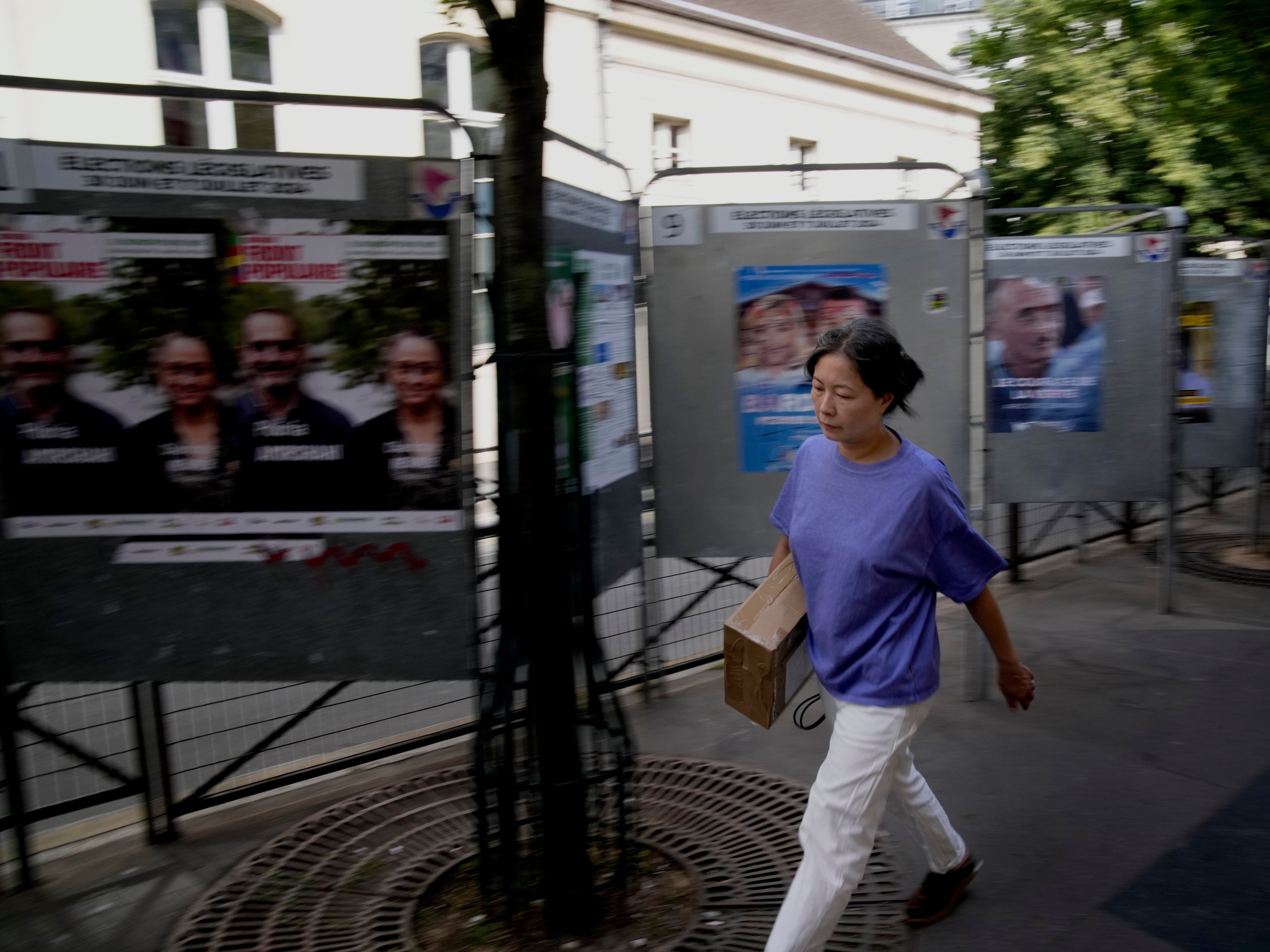 Polls open in France’s early parliamentary election