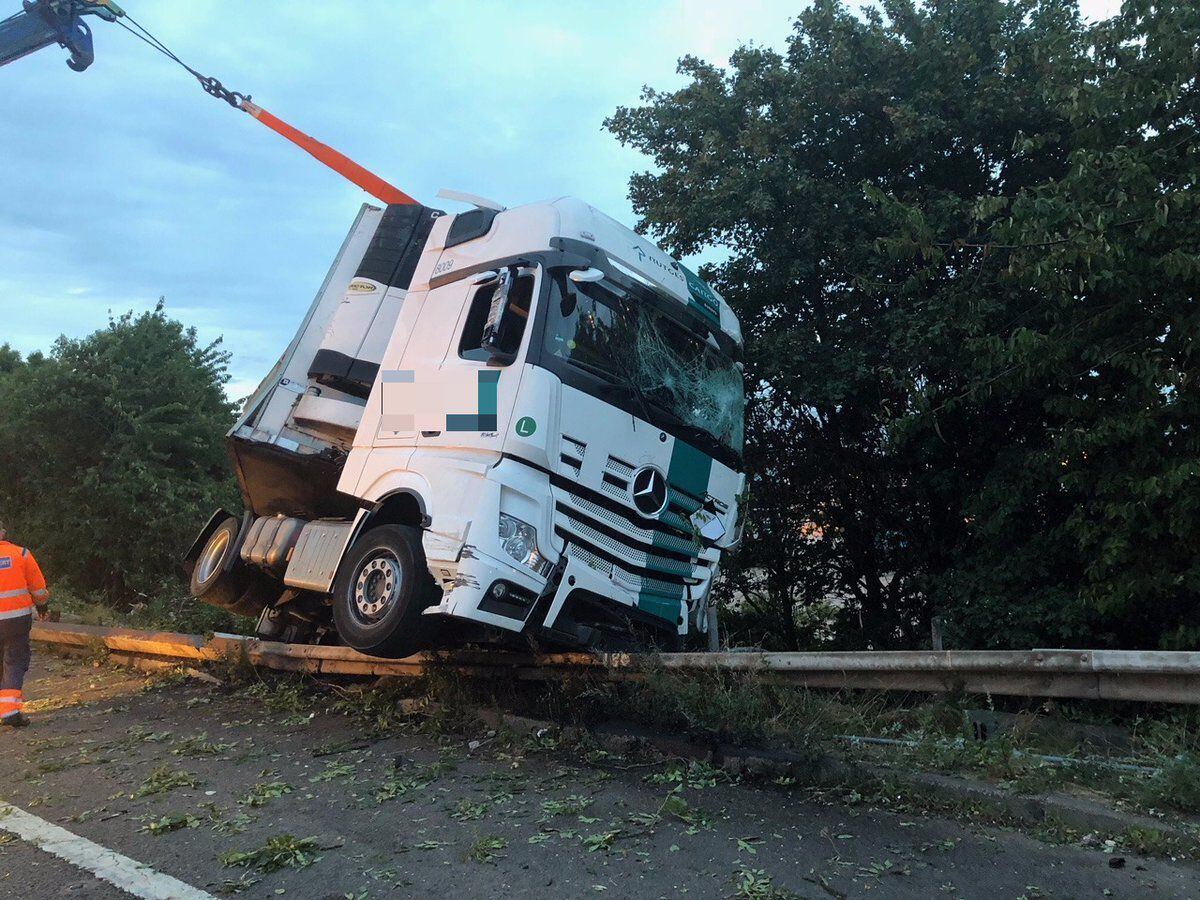 M6 Crash: Driver Injured After Lorry Ploughs Through Barriers And Down ...